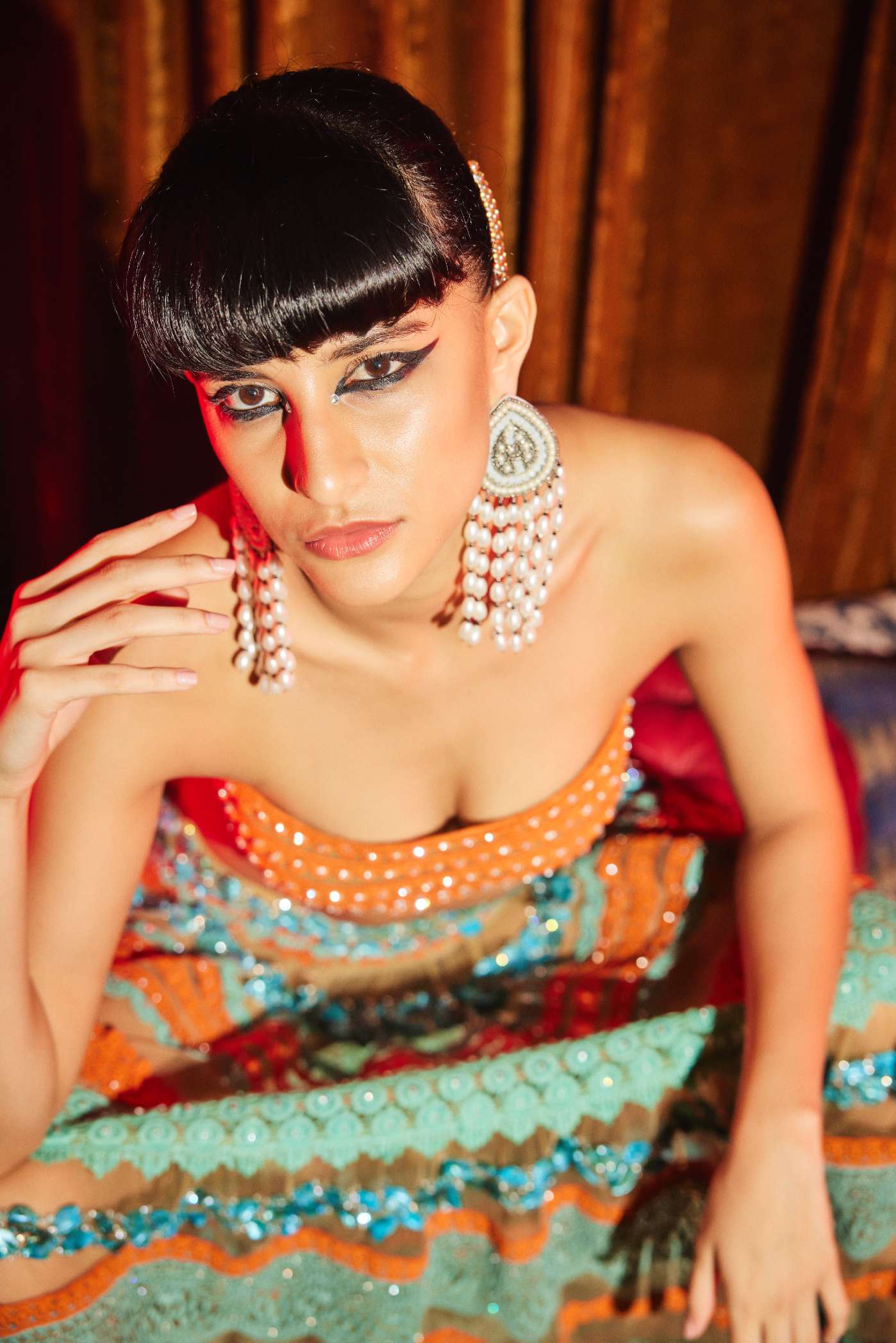 Turquoise And Coral Border Skirt
With Mother Of Pearl Embroidery