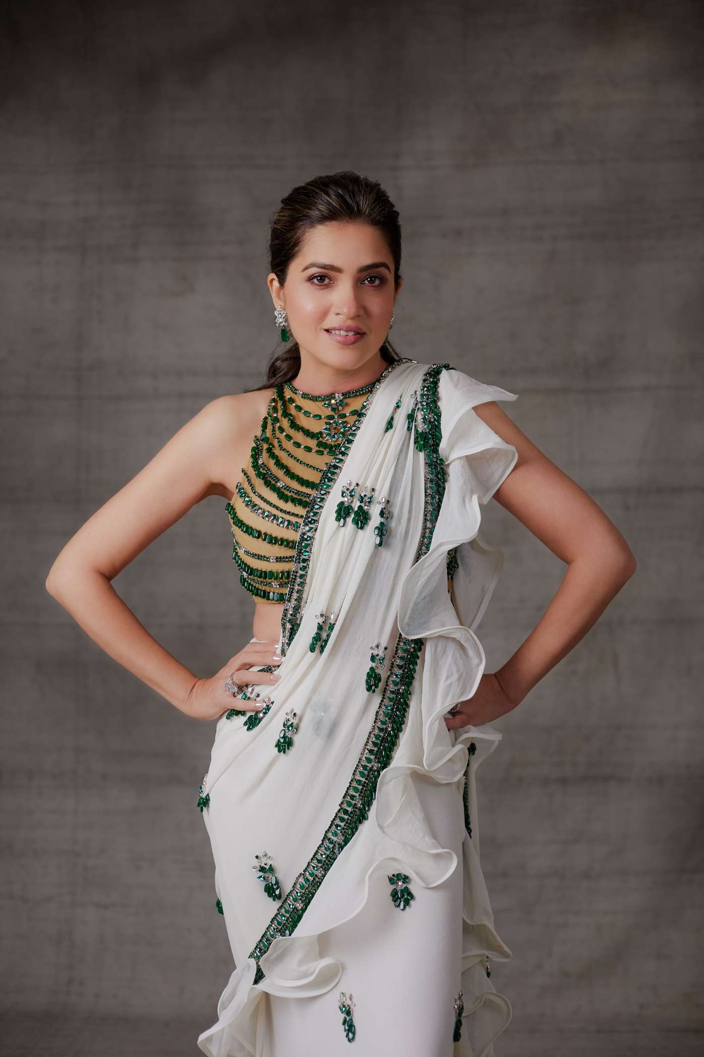 Ivory Ruffle Georgette Saree with Emerald Stone Motifs and Border