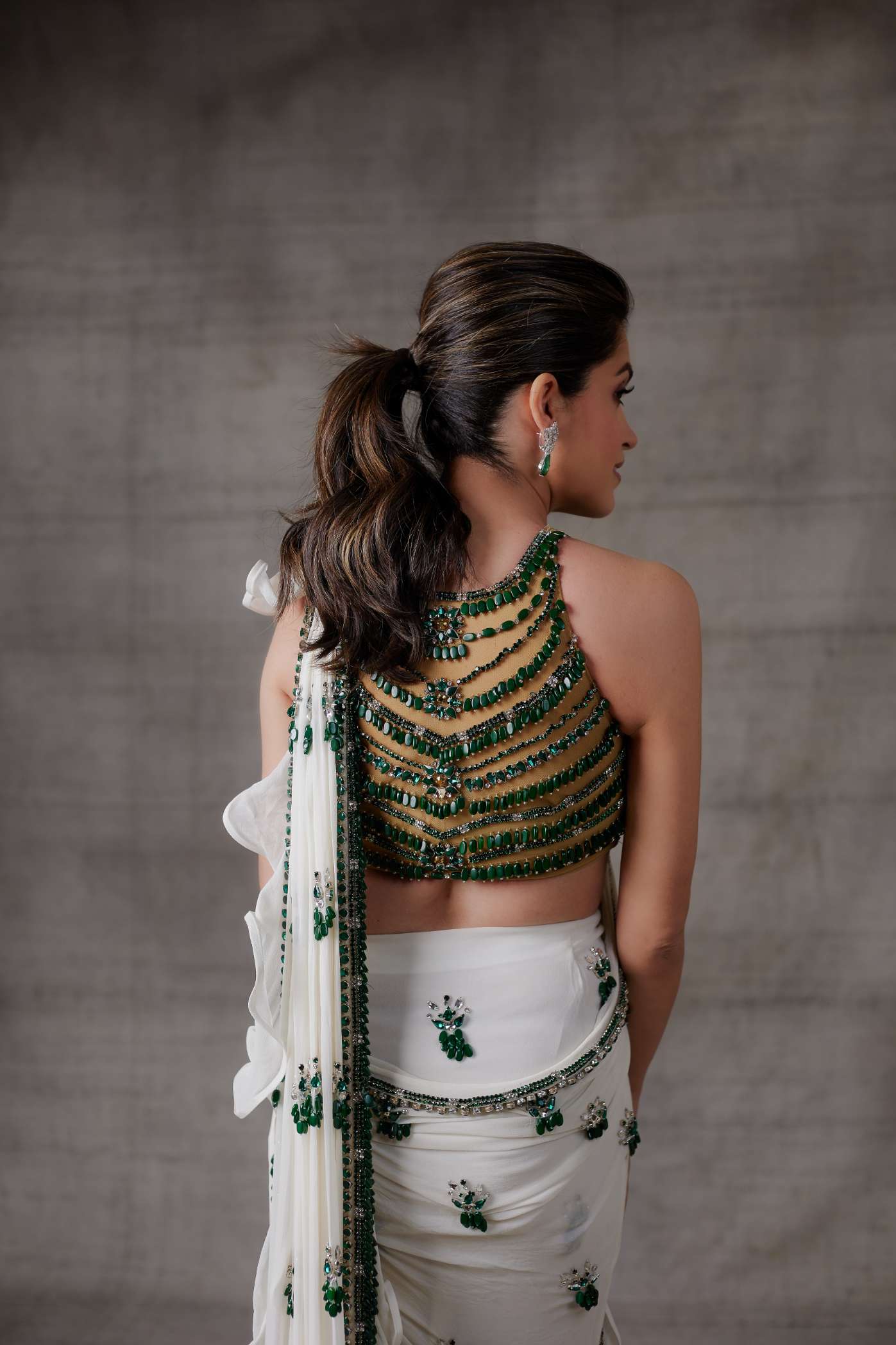 Ivory Ruffle Georgette Saree with Emerald Stone Motifs and Border