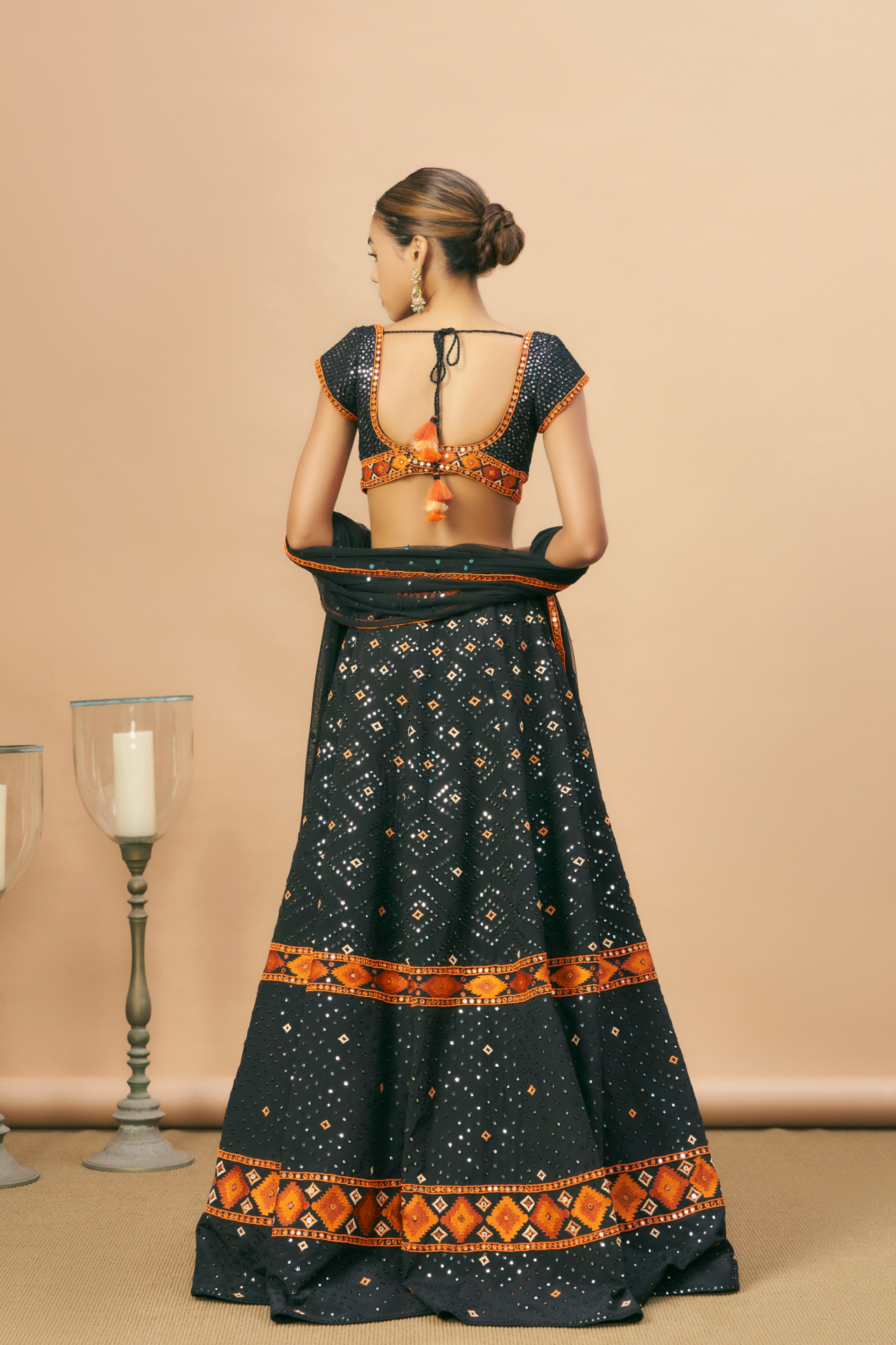 Black mirror lehenga with Aztec border, choli and dupatta