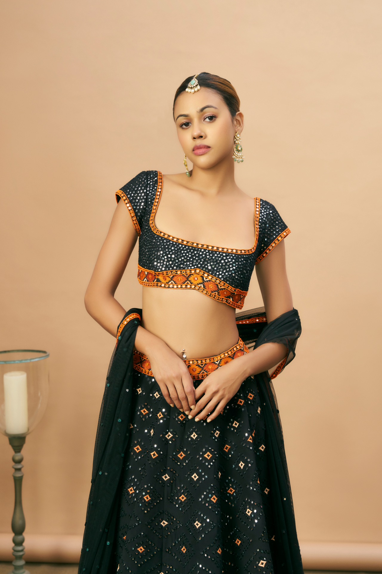 Black mirror lehenga with Aztec border, choli and dupatta