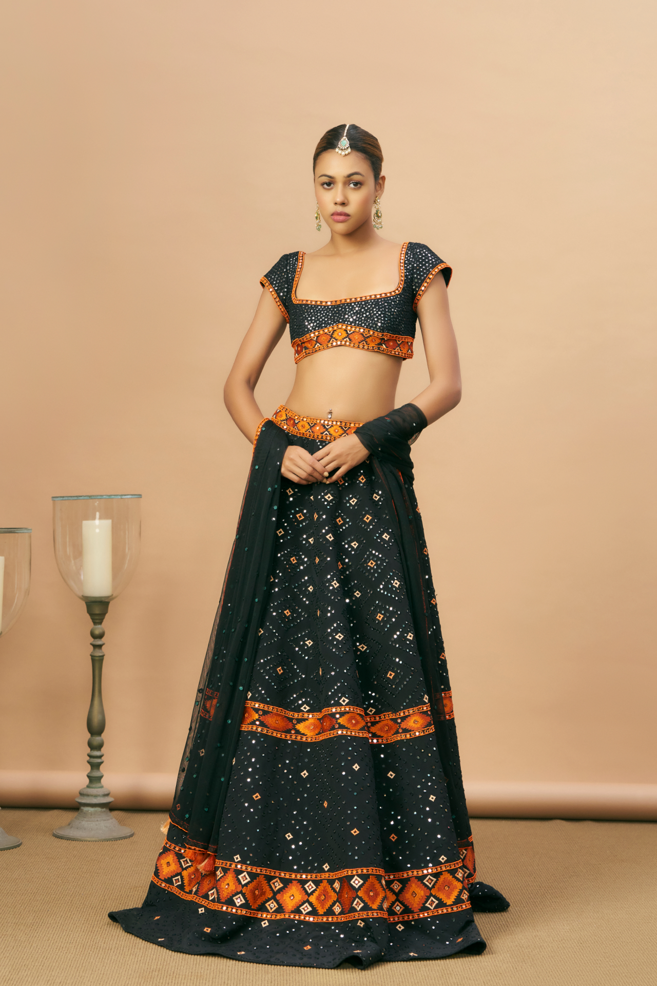 Black mirror lehenga with Aztec border, choli and dupatta