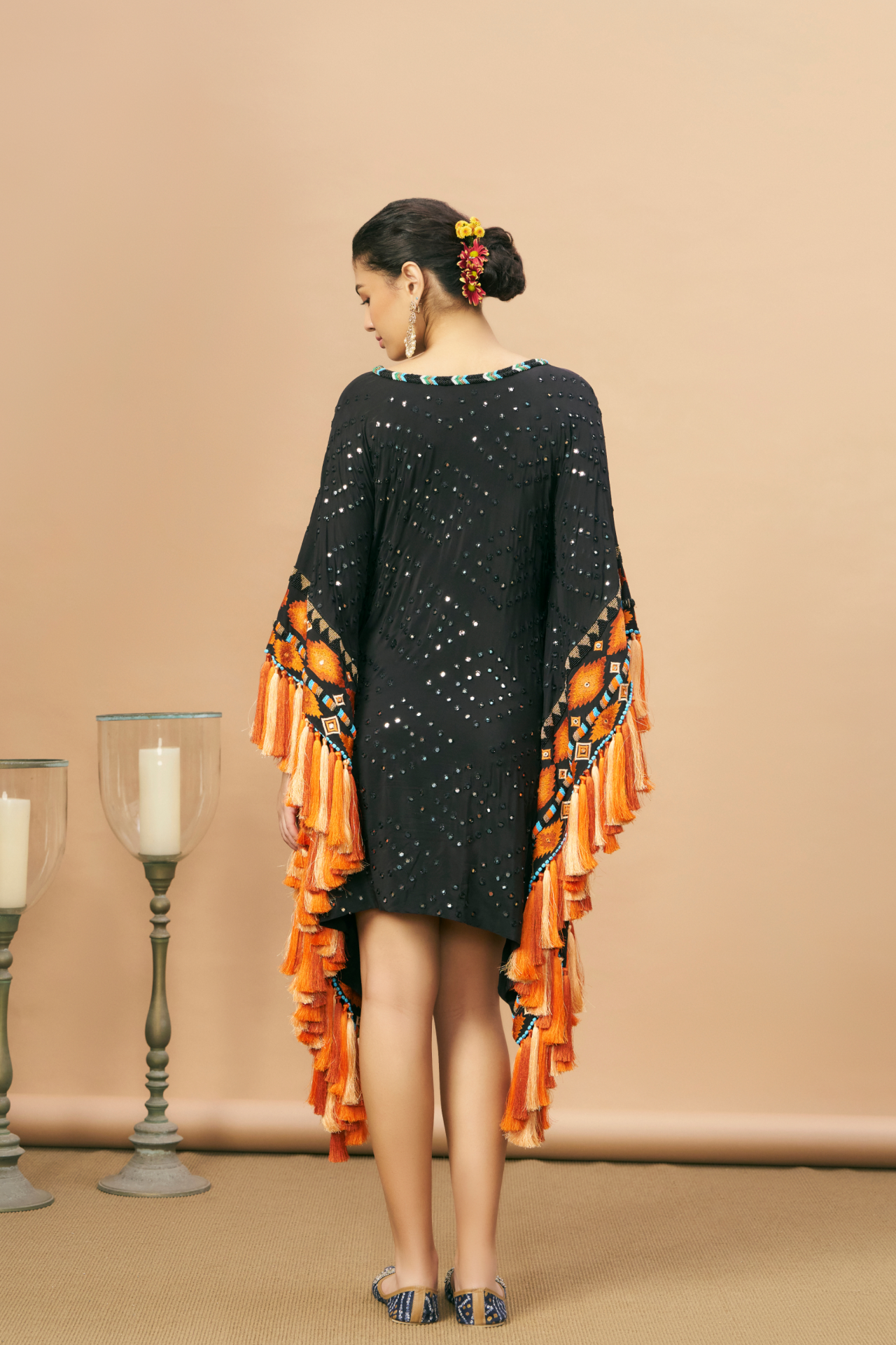 Black short kaftan with Aztec border and tassels