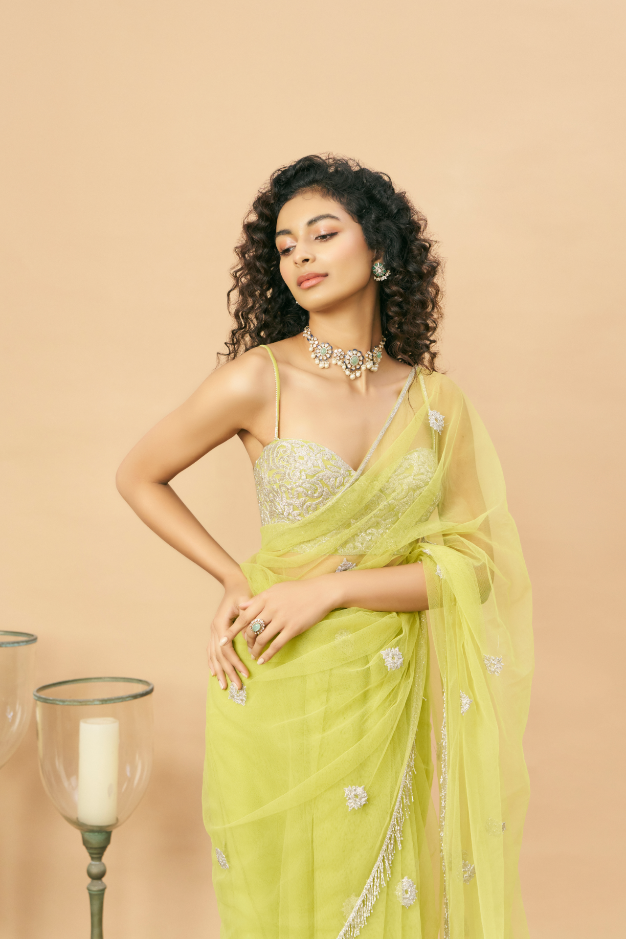 Green strappy blouse and saree with silver cutbead embroidery