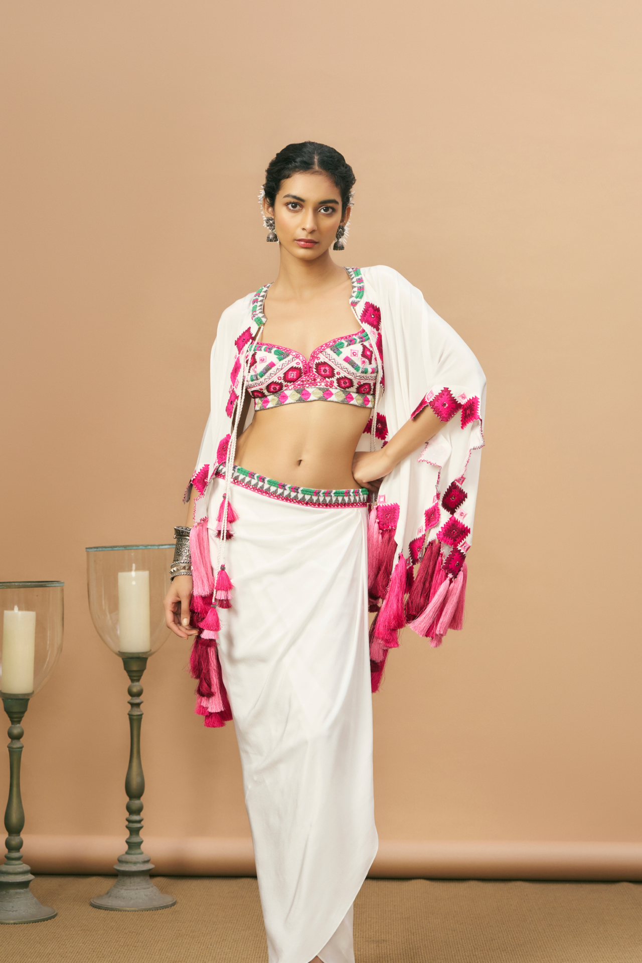 Ivory blouse, drape skirt and pink Aztec cape