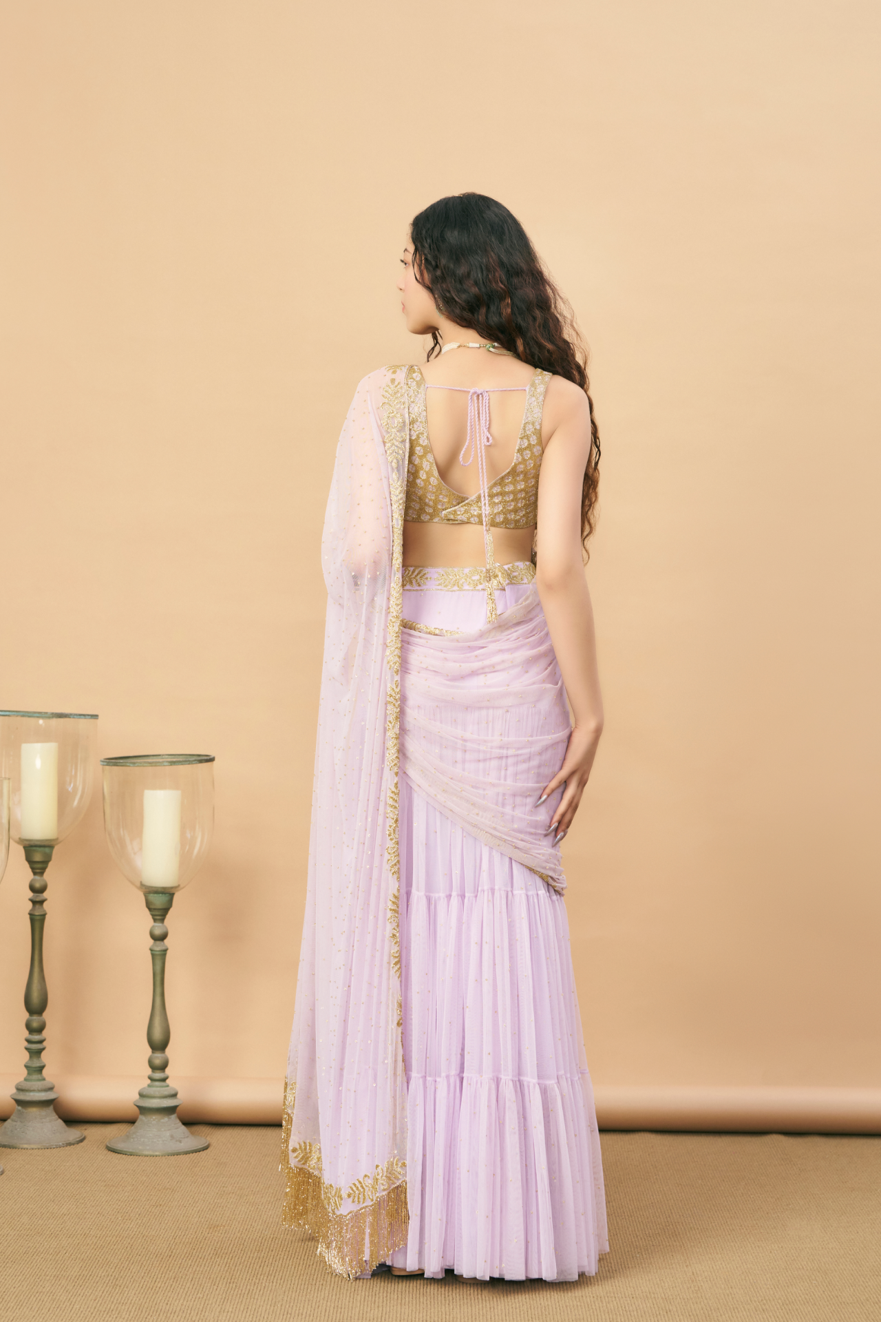 Lavender ready-tiered saree with gold cutbead embroidered blouse
