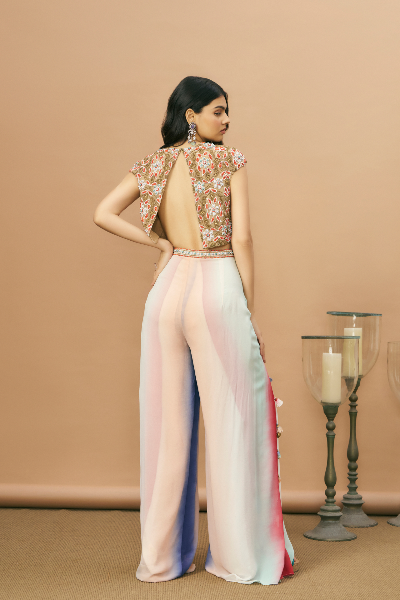 Nude crop top with coral embroidery and shaded wrap pants
