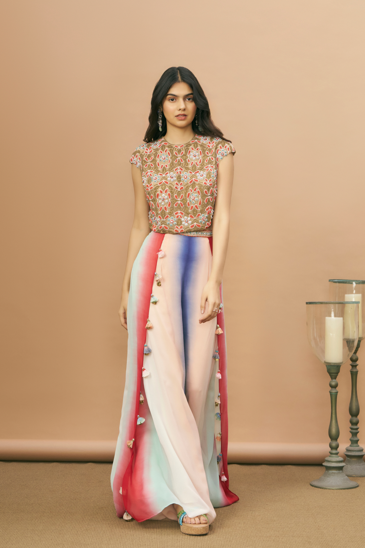 Nude crop top with coral embroidery and shaded wrap pants