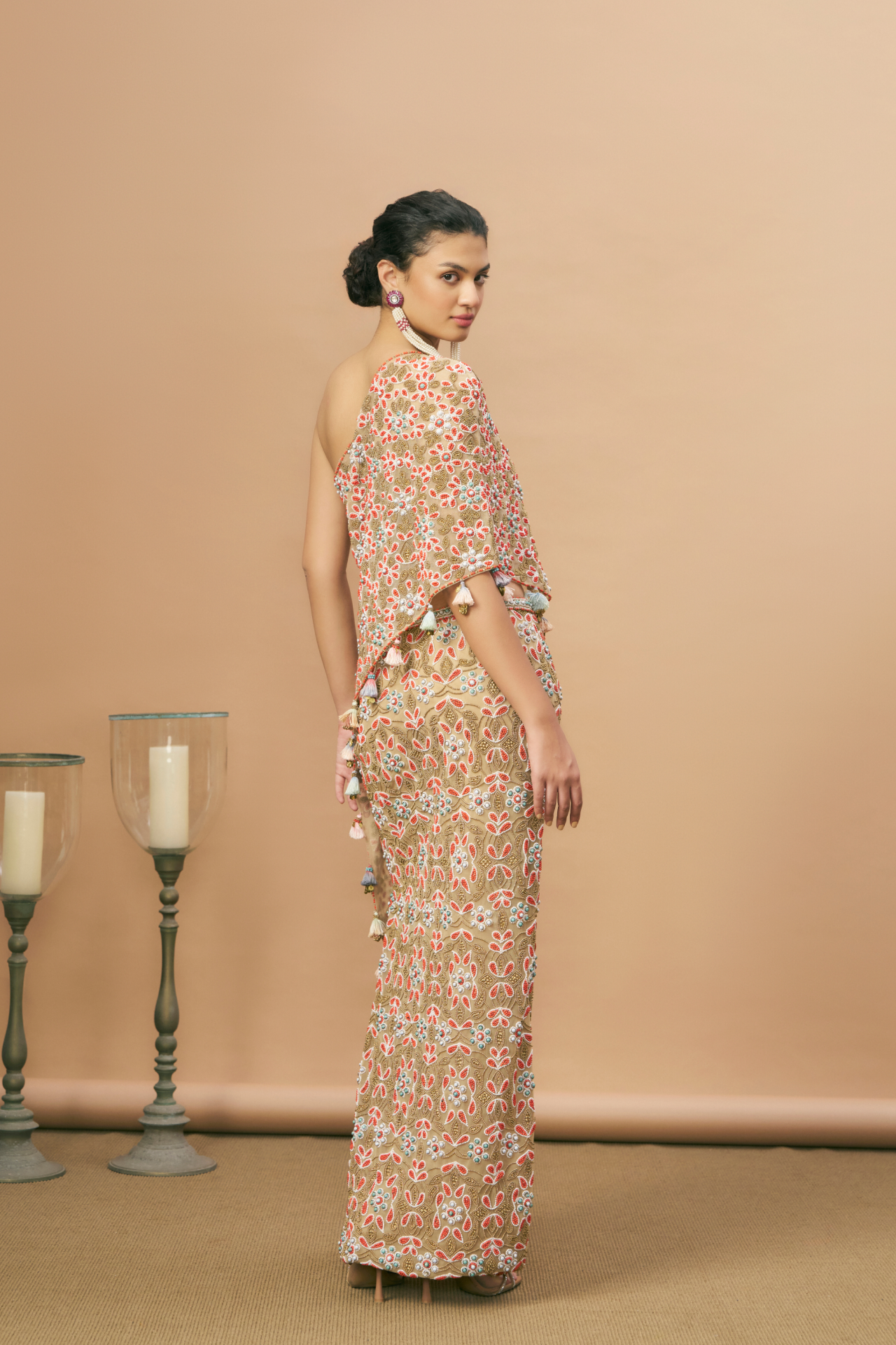 Nude one-shoulder blouse and long skirt with coral embroidery
