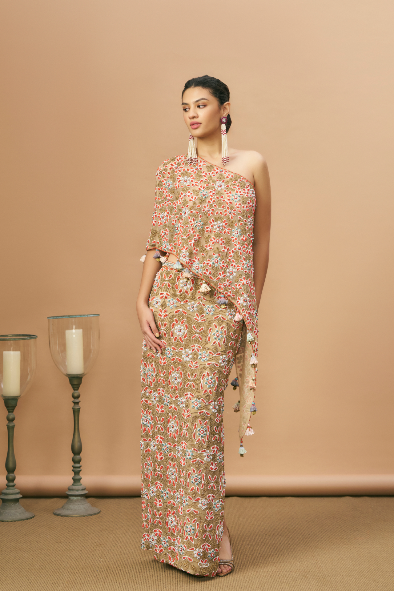 Nude one-shoulder blouse and long skirt with coral embroidery