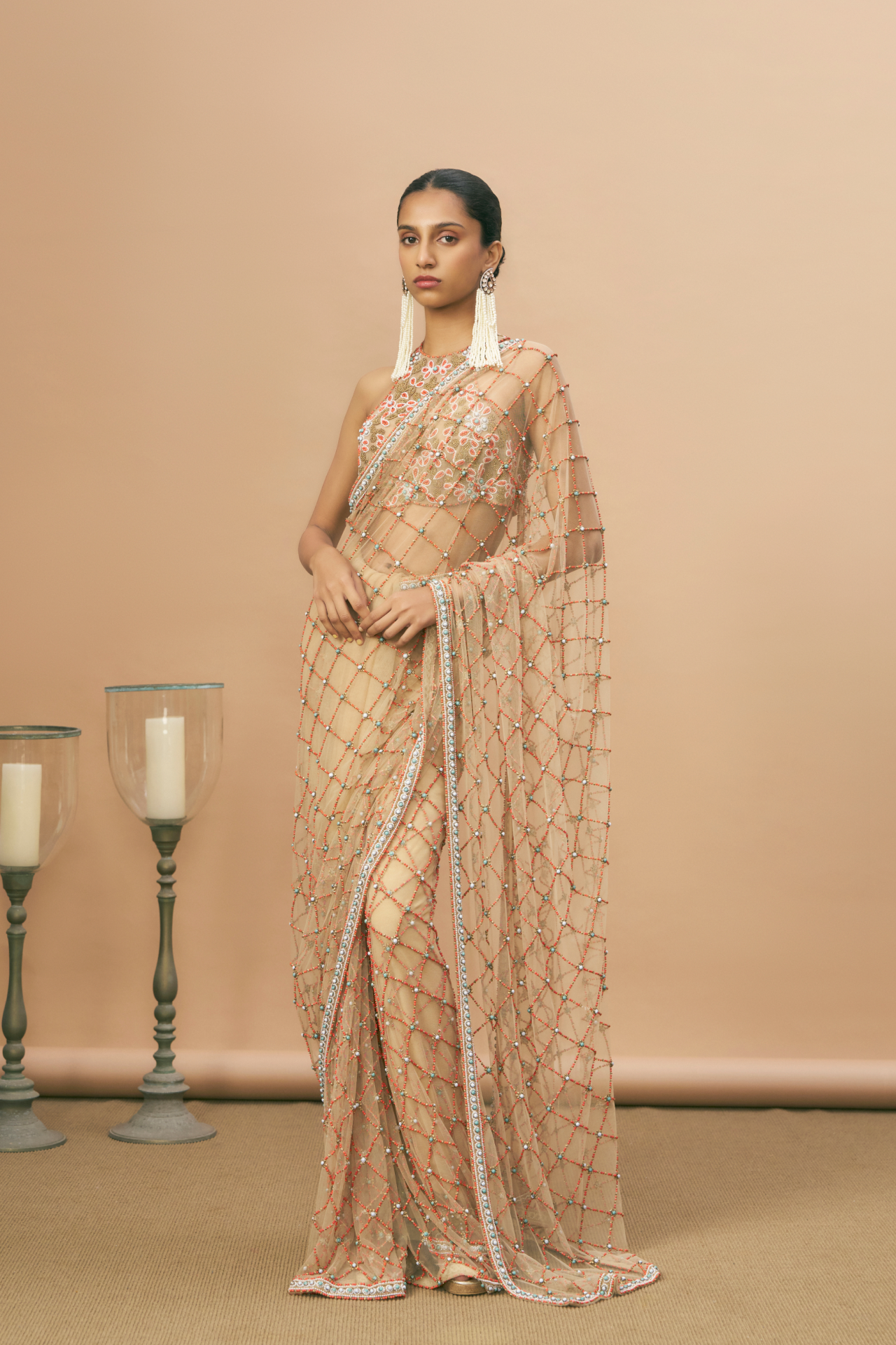 Nude racerback blouse and saree with coral embroidery