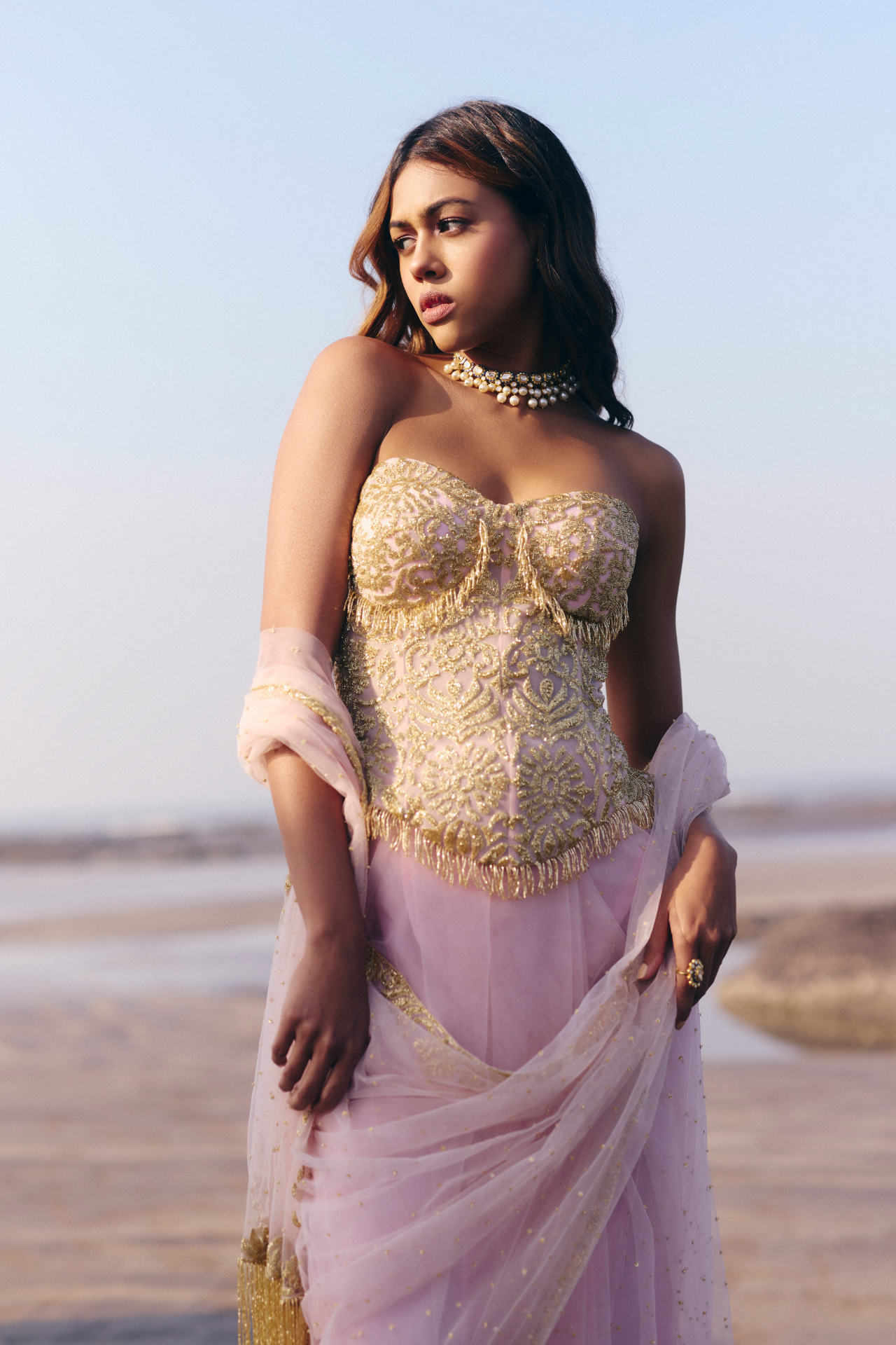 Pink corset with gold cutbead embellishment and saree with cutbead embroidered border