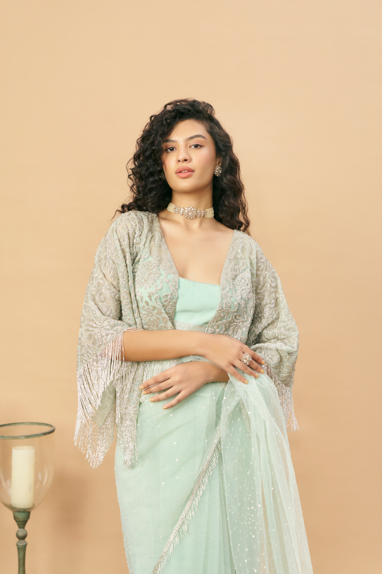 Sea green silver cutbead border embroidered saree with strappy blouse and embroidered kaftan jacket
