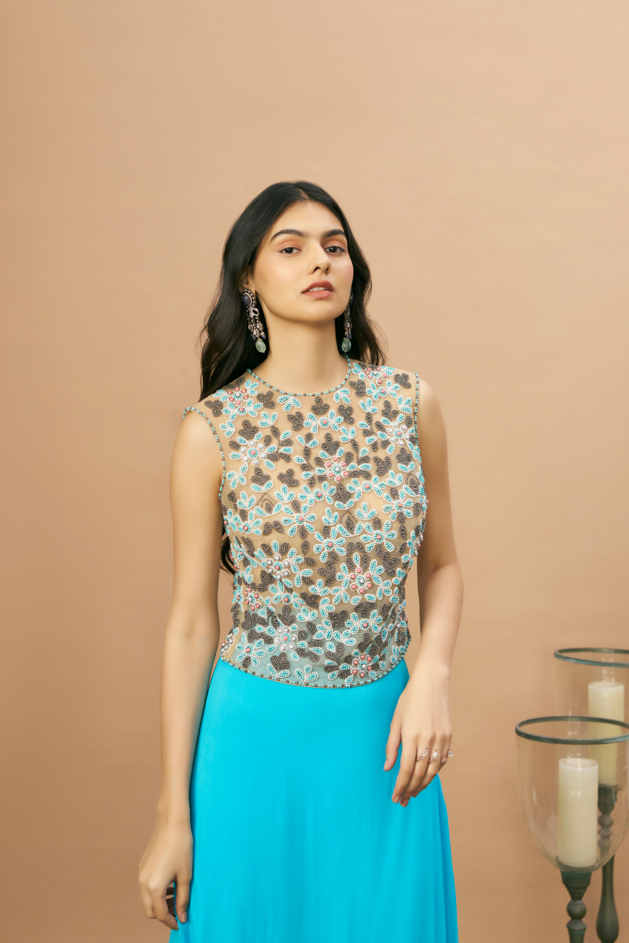 Turquoise embroidered box top with belt and ombré godet skirt