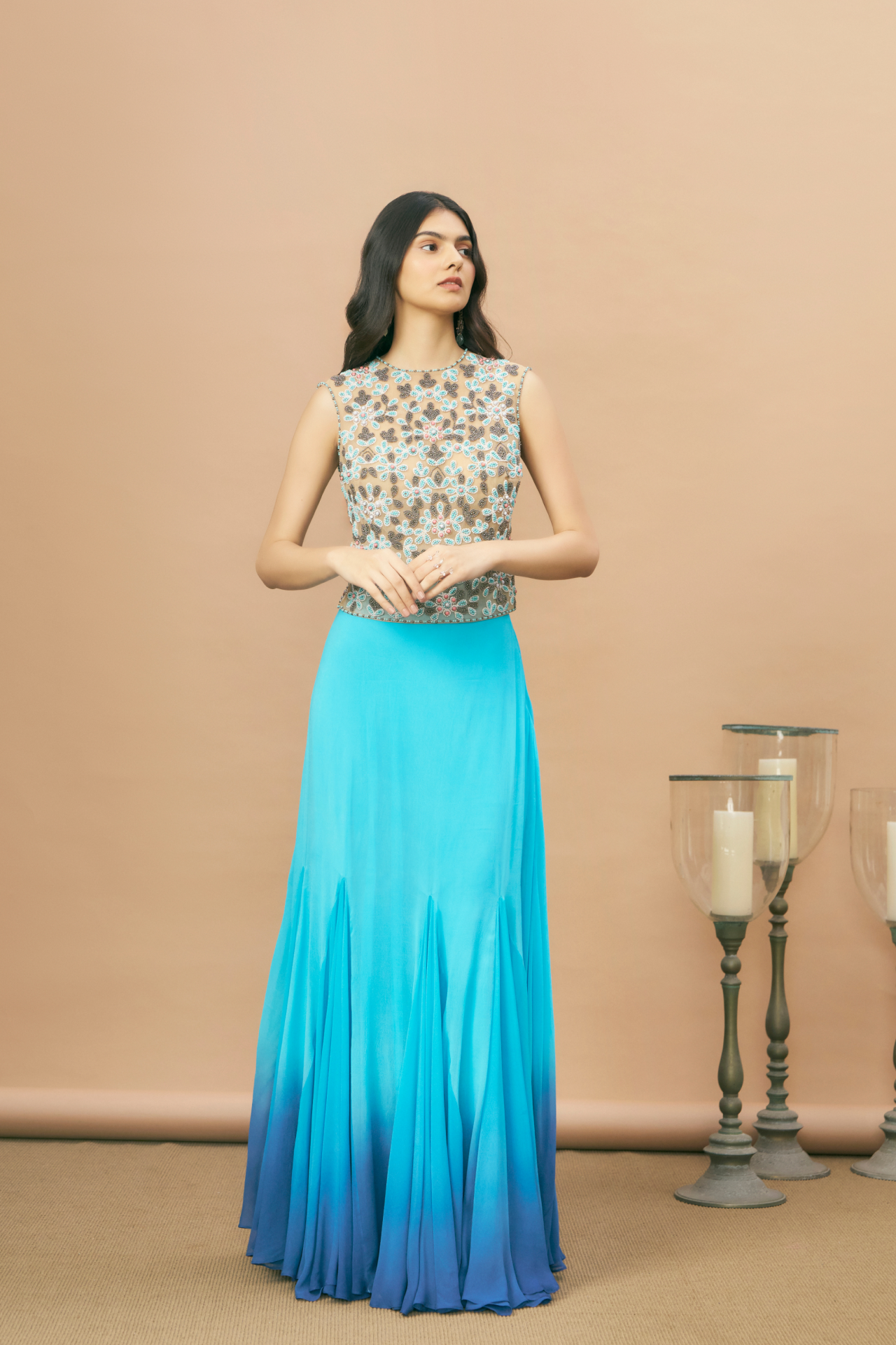 Turquoise embroidered box top with belt and ombré godet skirt